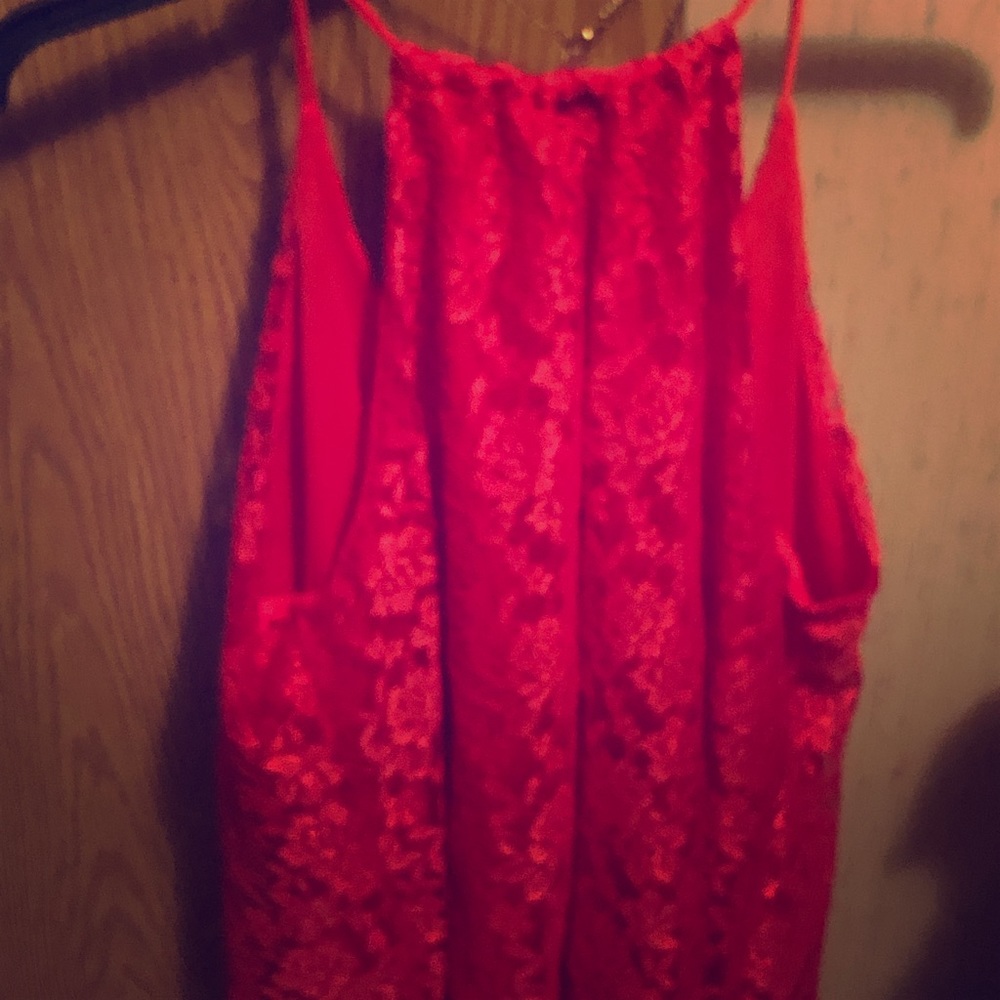 A lace pattern camisole with built in necklace